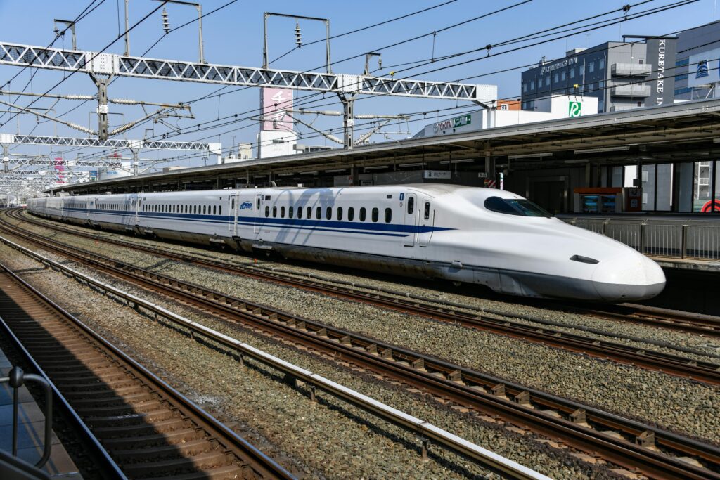 A high-speed bullet train at Hamamatsu Station in Shizuoka, Japan, showcasing modern rail transport. Do you need a JR Pass?